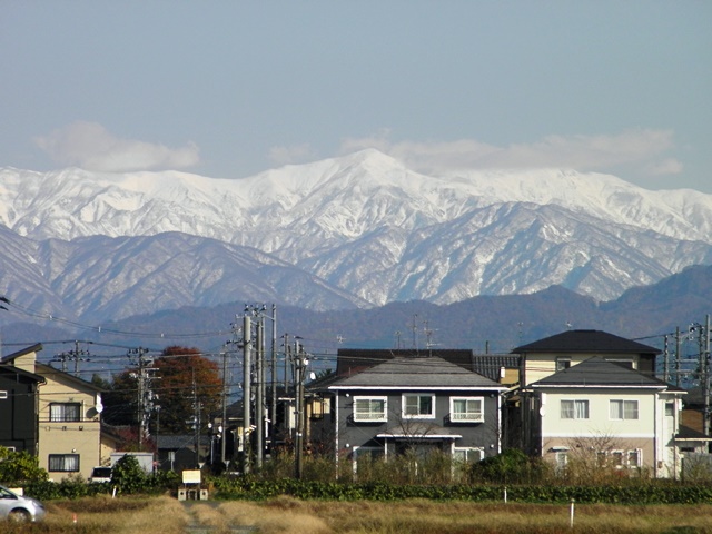 Snow covered Iide mountain in November, view from Akiha-ward Niigata-shi 